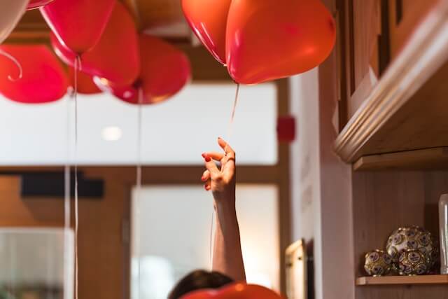 holding a balloon